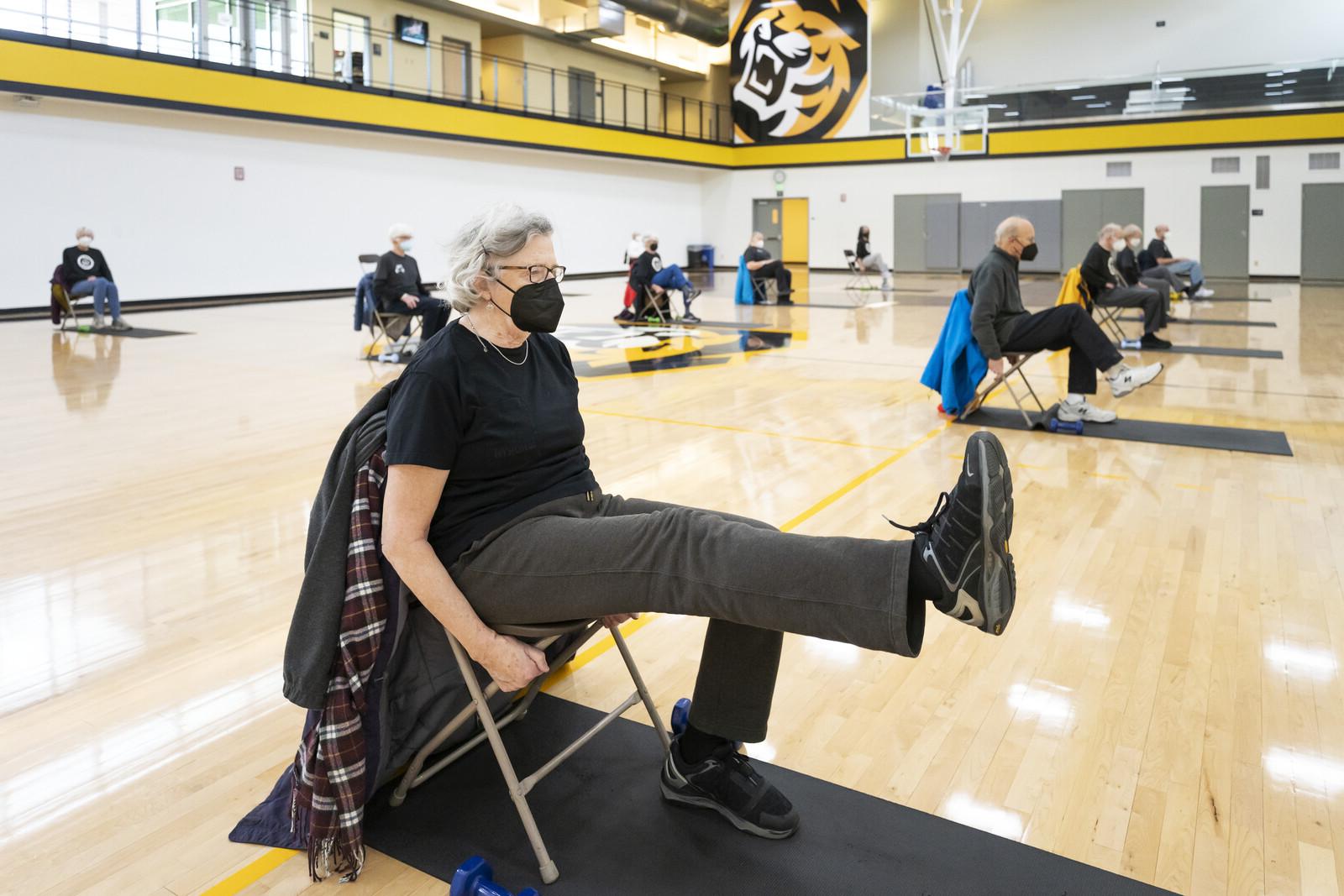 Kathy Lindeman during a chair exercise <span class="cc-gallery-credit">[Lonnie Timmons III]</span>